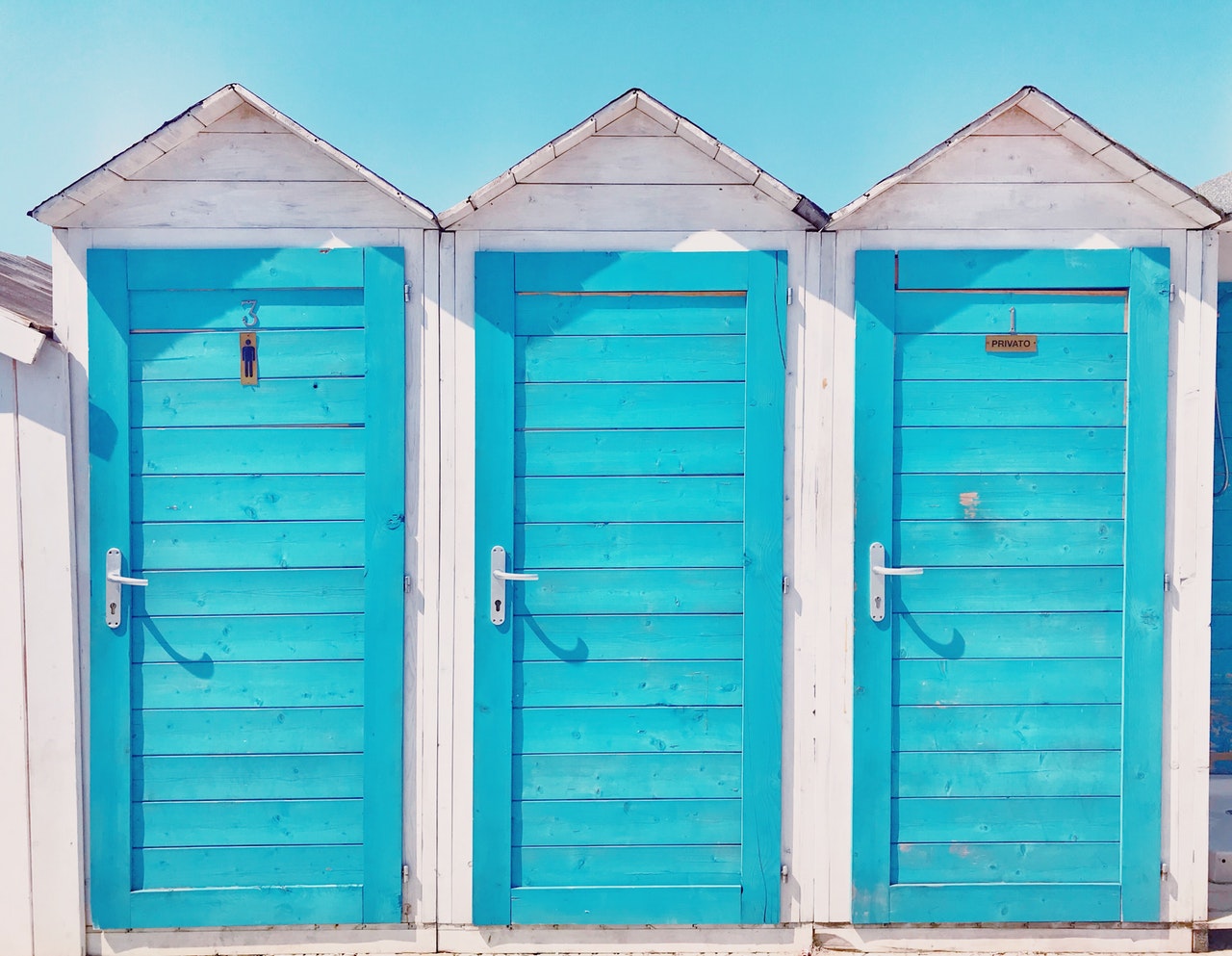 photo-of-three-wooden-toilets-1427722-1