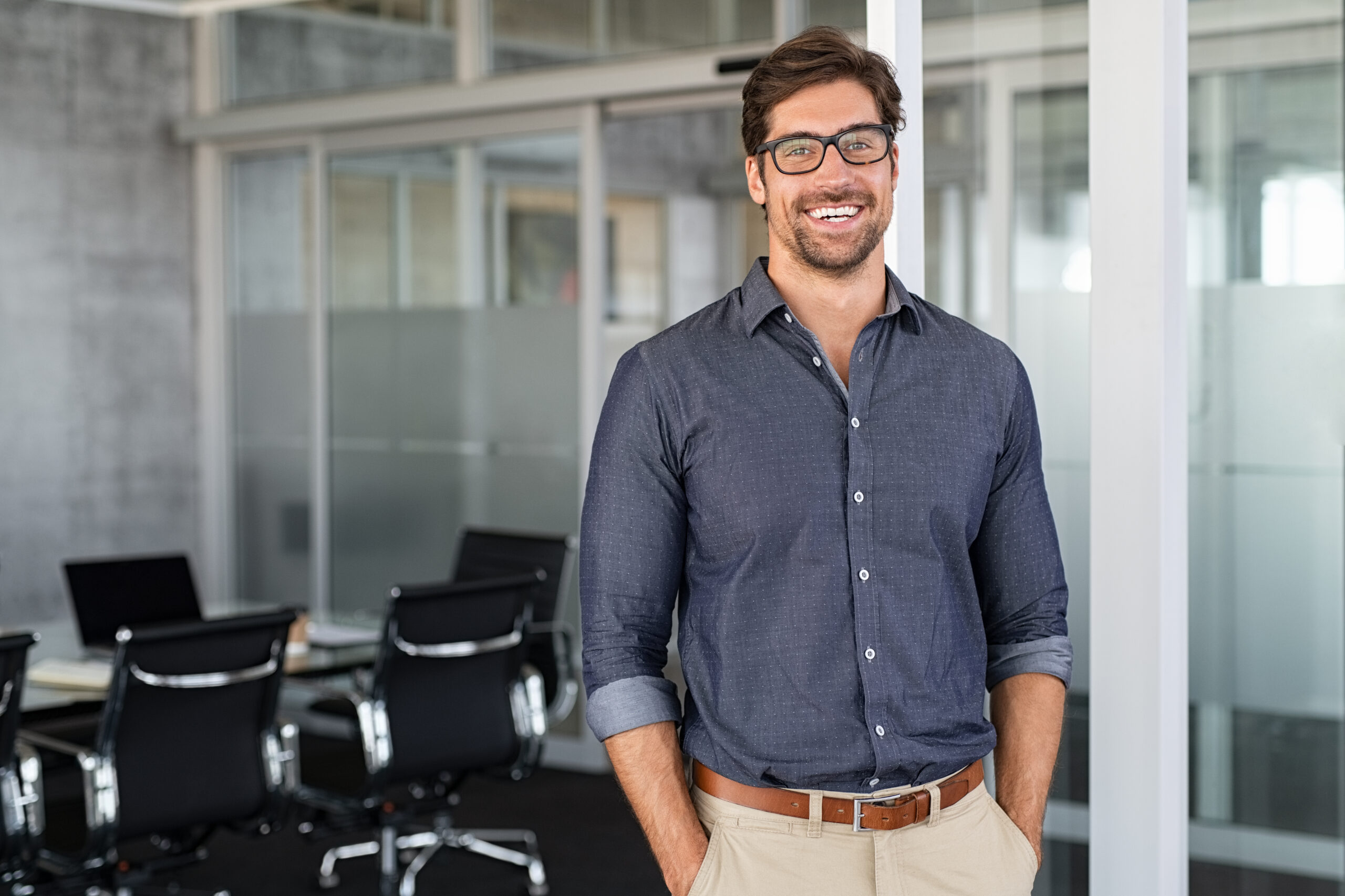 Success businessman smiling in office