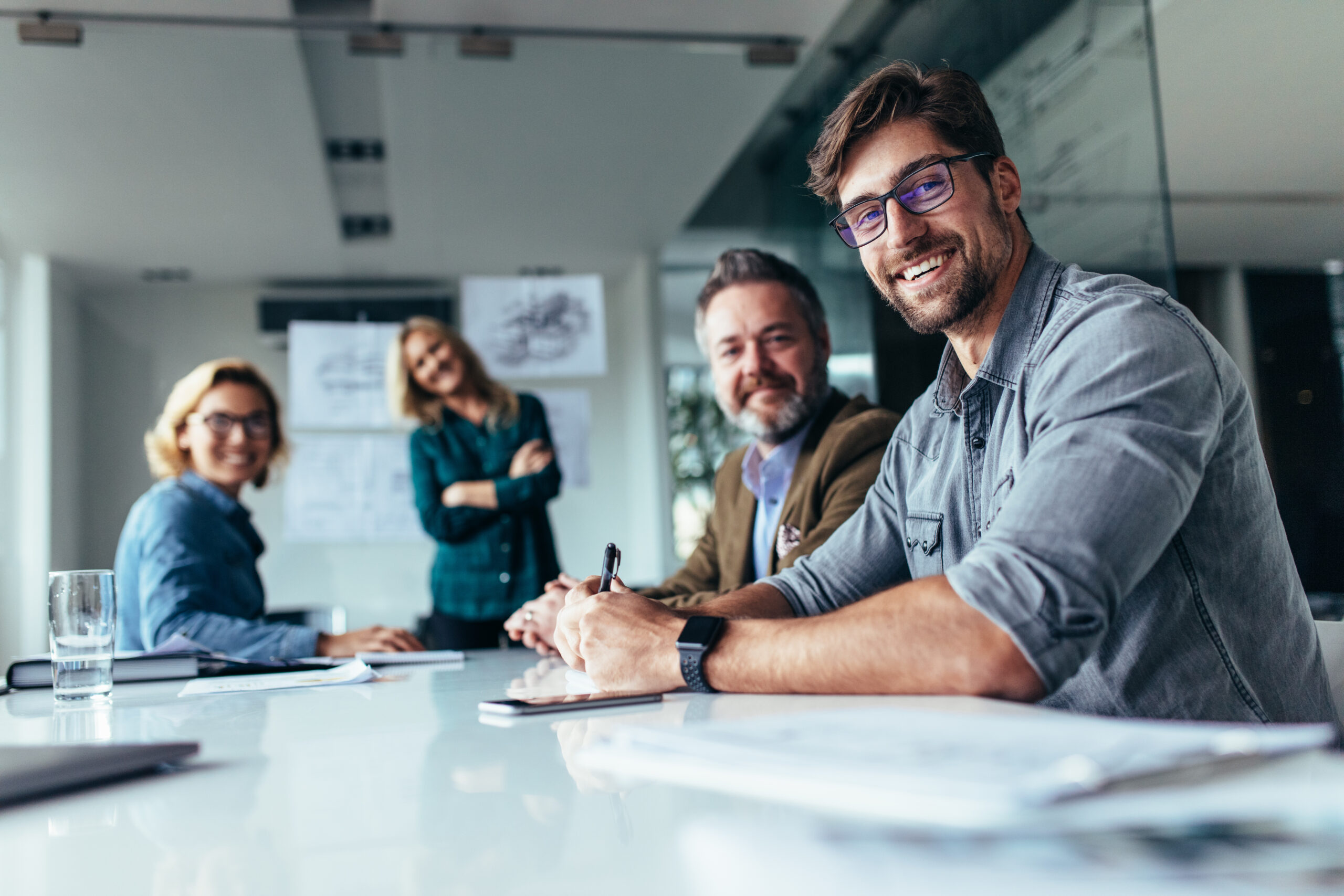 Happy group of businesspeople during presentation